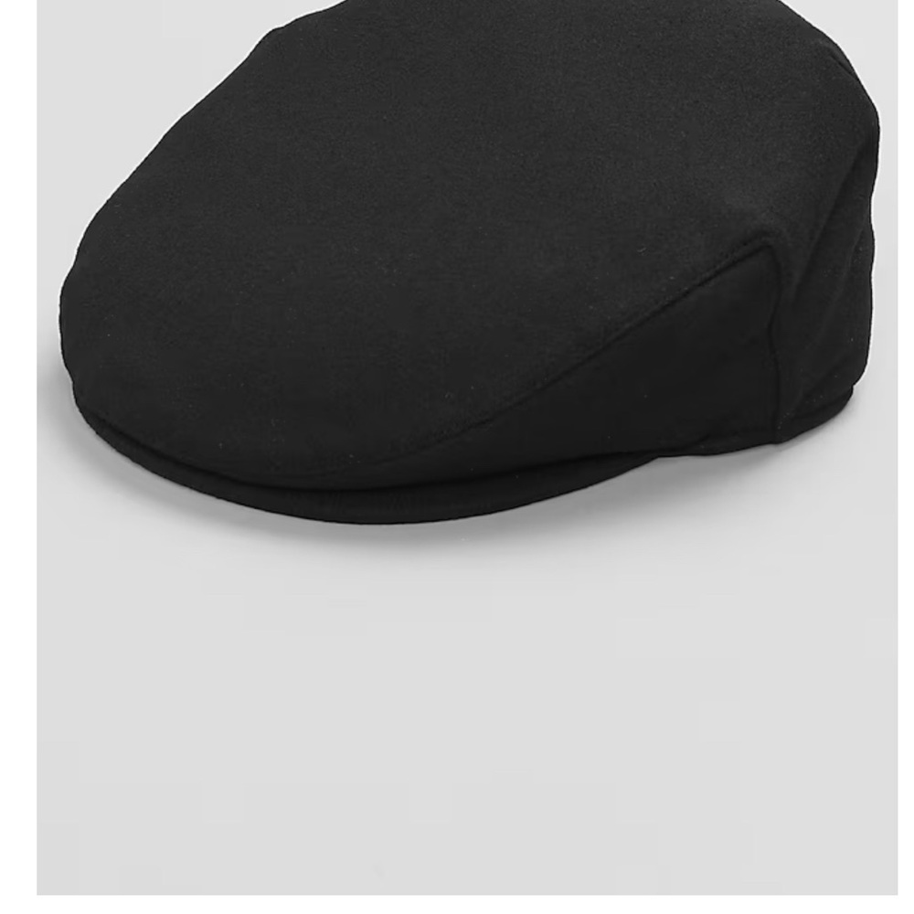 Classic Black Flat Cap by Jos A Banks. New without tags. Never worn.